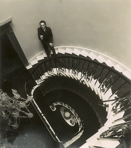 Norman Parkinson. Edward James on the grand staircase of 35 Wimpole Street